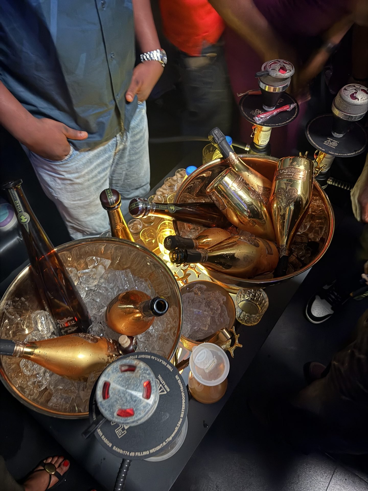 A VIP table with champagne bottles on ice